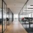 glass office partitioning systems divide an office into separate spaces